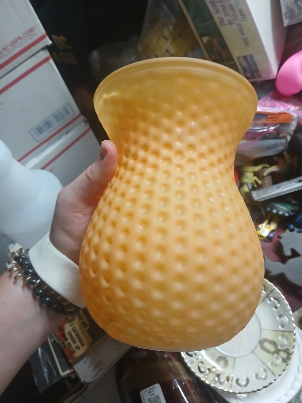 hobnail-style glass vase that resembles a 7.5" Frosted Amber Kendra Glass Vase